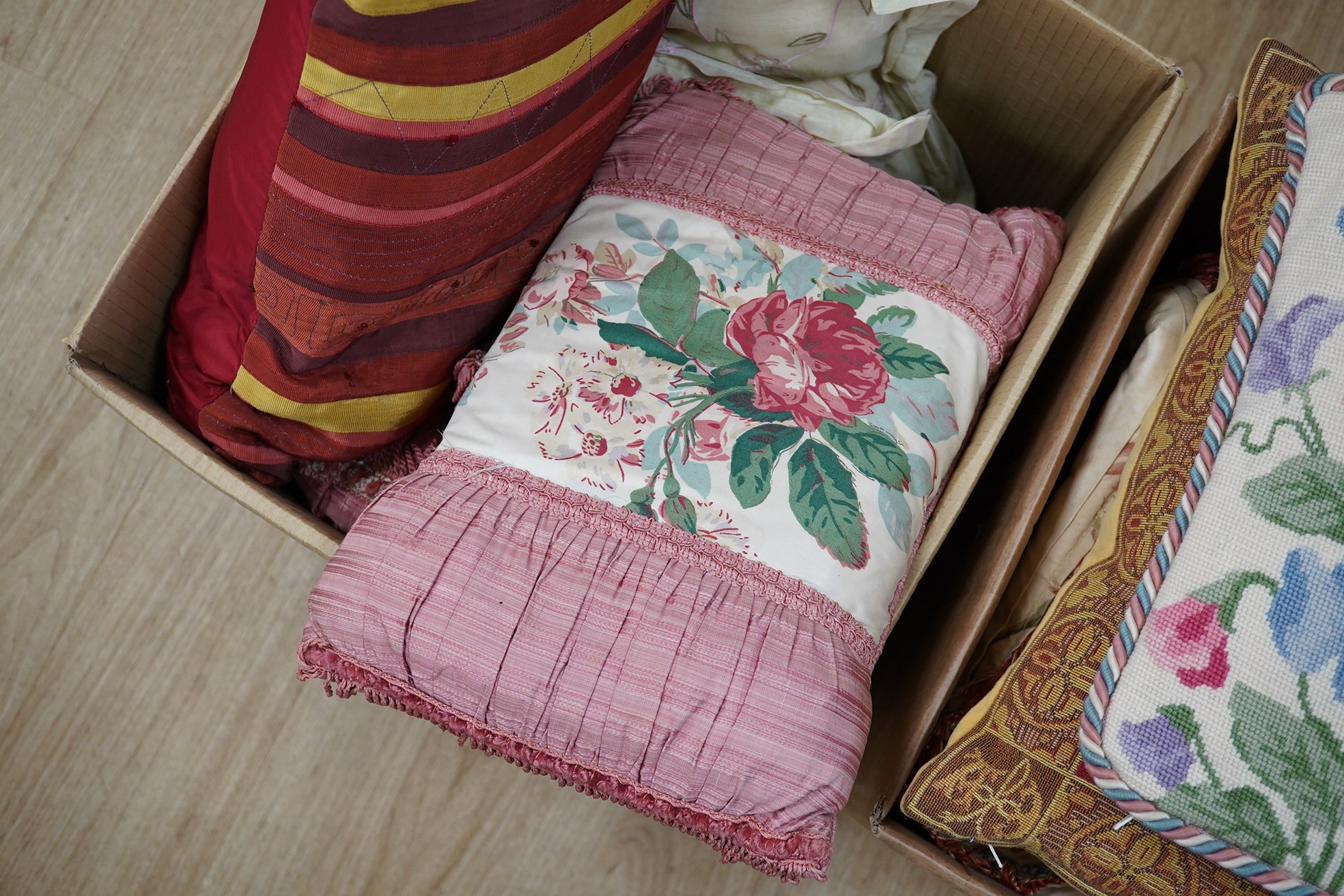 A quantity of cushions and a Colefax and Fowler printed floral curtain, (two boxes), curtain 180cm wide x 207cm long. Condition - fair